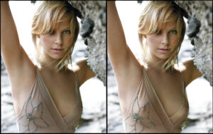 Woman on beach wearing dress that reveals her small and hard nipples.