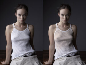 Sexy woman sitting almost naked, in thin fabric clothes, leaning back on her arms.
